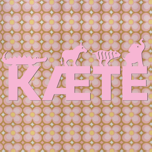 ZOO·FABET bogstaver i pink metal er lige til at klæbe op på væggen
